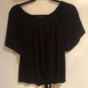 Black shirt with tie at bottom